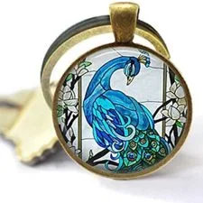 Llavero hfids de pavo real azul con medallón redondo