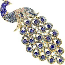 Broche KristLand de pavo real azul y dorado