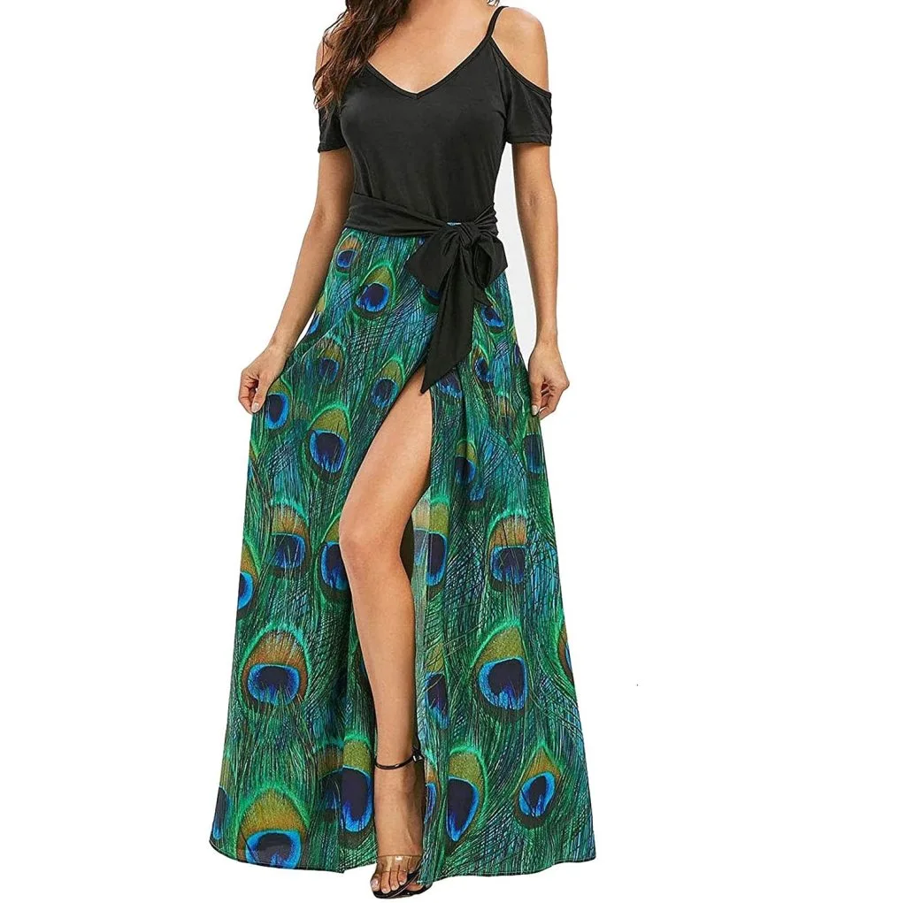 Vestido NUSGEAR negro con falda de plumas verdes · M