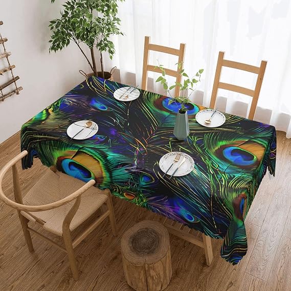 Mantel rectangular Ginfult de plumas sobre fondo oscuro · 137 × 183 cm